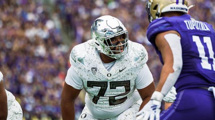 Oregon Ducks offensive lineman Iapani Laloulu ahead of a snap against the Washington Huskies.